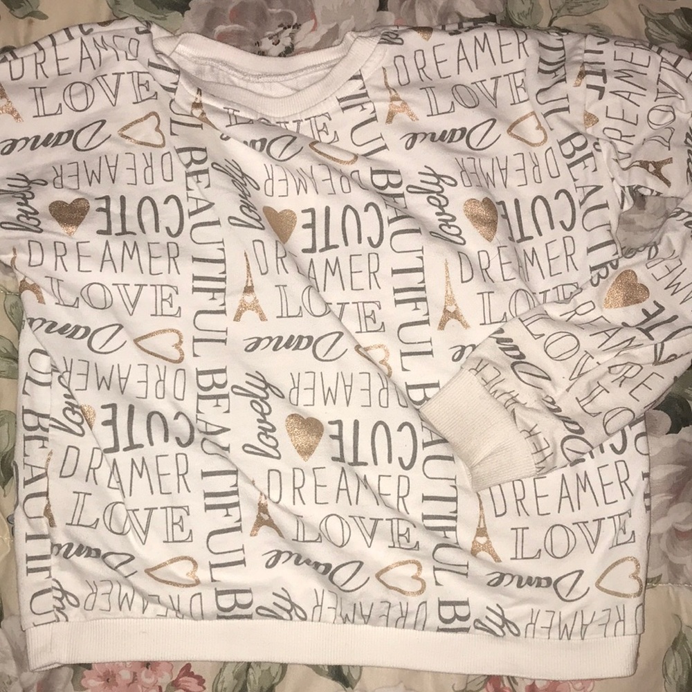 Black white and gold sweater